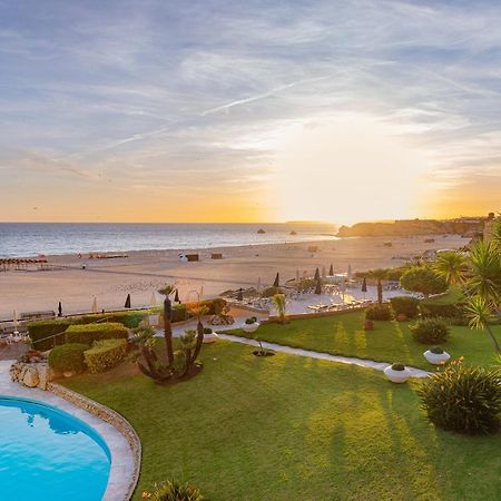 โรงแรมอัลการ์เว กาสิโน ปอร์ติเมา ภายนอก รูปภาพ Sunset at the beach