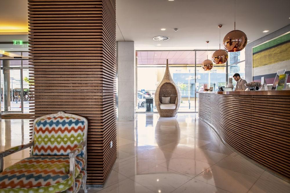 โรงแรมอัลการ์เว กาสิโน ปอร์ติเมา ภายนอก รูปภาพ The lobby of the hotel